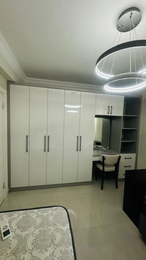 White wardrobe front and dressing table